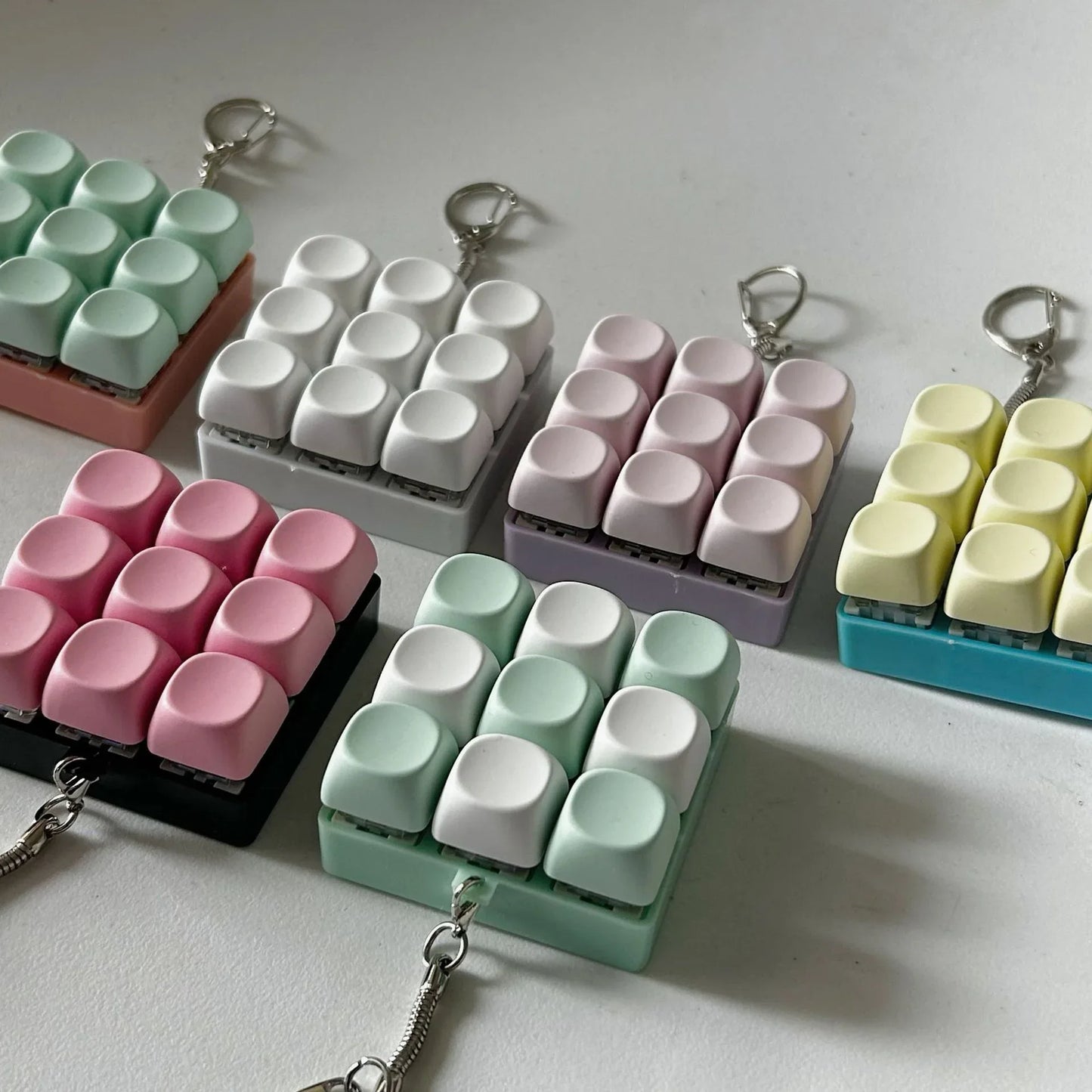 2-Pack White Mechanical 9-Keyboard Fingertip Toy Keychain - Key Pressure Relief, PVC Fingertip Toy - Mekamart Australia