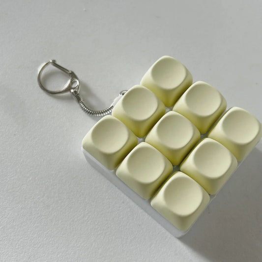 2-Pack Light Yellow Mechanical 9-Keyboard Fingertip Toy Keychain - Key Pressure Relief, PVC Fingertip Toy - Mekamart Australia