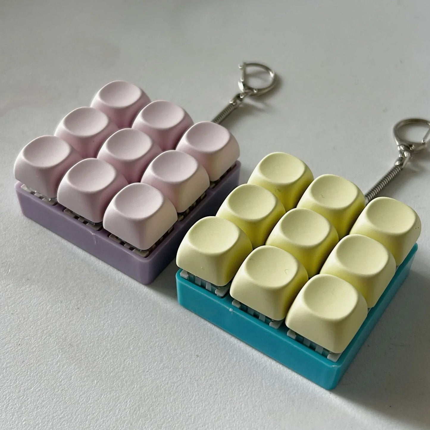 2-Pack Light Yellow Mechanical 9-Keyboard Fingertip Toy Keychain - Key Pressure Relief, PVC Fingertip Toy - Mekamart Australia