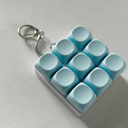2-Pack Light Blue Mechanical 9-Keyboard Fingertip Toy Keychain - Key Pressure Relief, PVC Fingertip Toy - Mekamart Australia