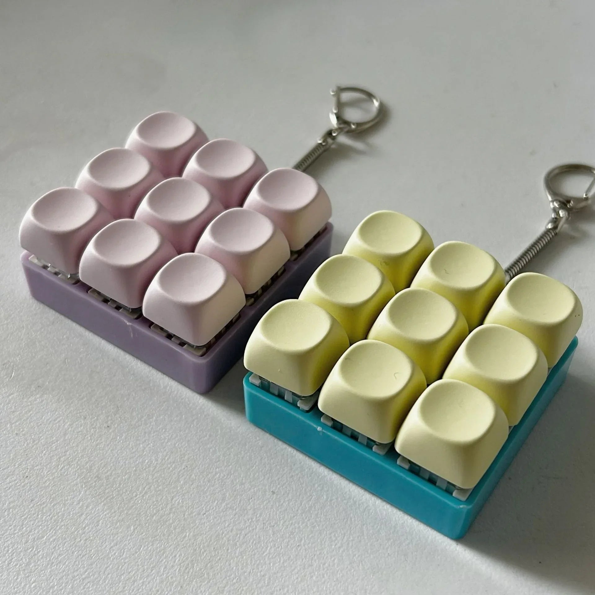 2-Pack Light Blue Mechanical 9-Keyboard Fingertip Toy Keychain - Key Pressure Relief, PVC Fingertip Toy - Mekamart Australia