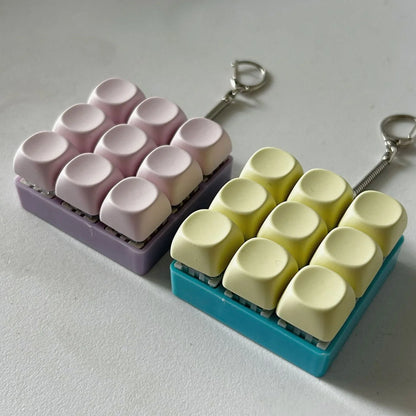 2-Pack Light Blue Mechanical 9-Keyboard Fingertip Toy Keychain - Key Pressure Relief, PVC Fingertip Toy - Mekamart Australia